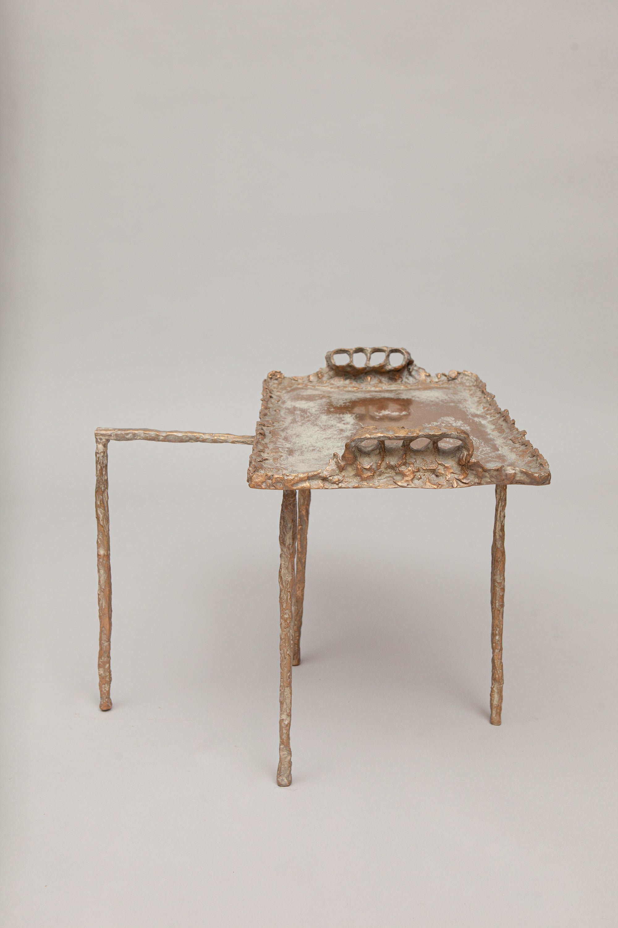 THE STRETCHED ORNAMENTAL TABLE